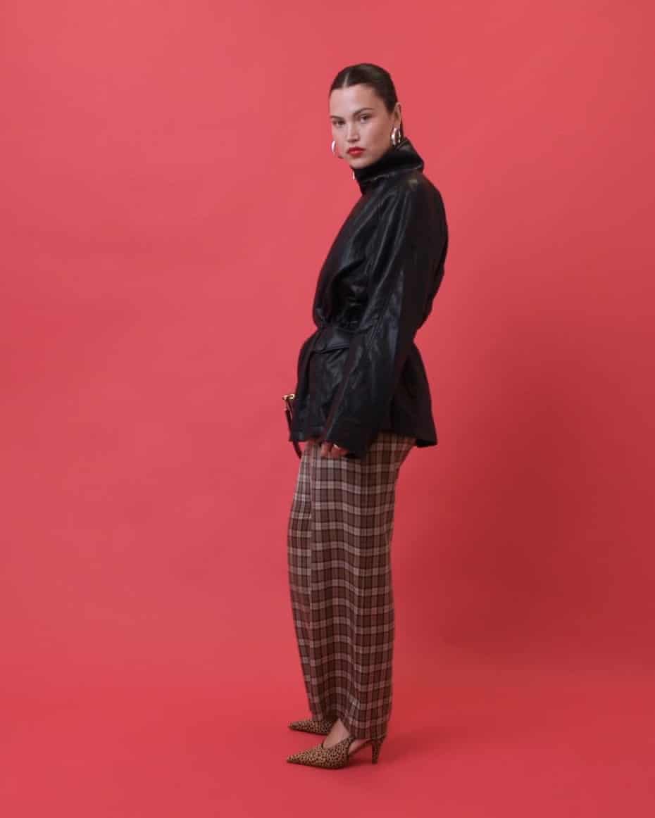 Black Leather Jacket Over Black Turtleneck with Plaid Trousers Black Leather Jacket Over Black Turtleneck with Plaid Trousers — Classy Leather Outfits