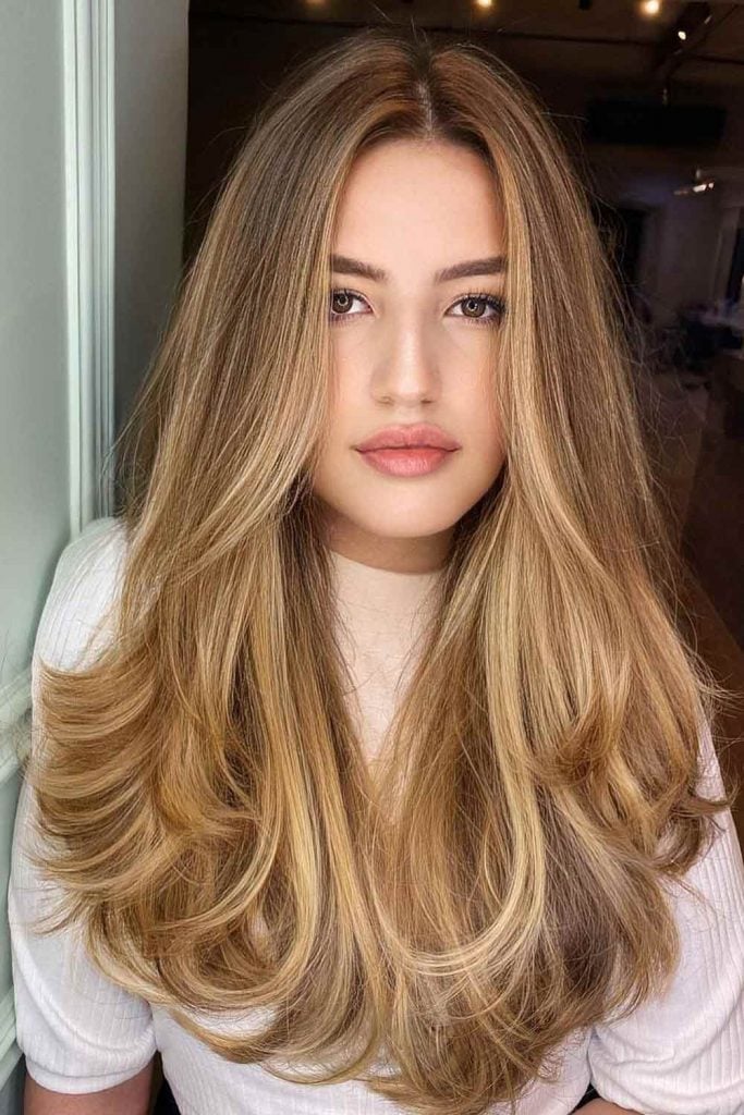 Honey Blonde Mid-Back Style With Face-Framing Bangs Honey Blonde Mid-Back Style With Face-Framing Bangs — Classy Length Hair