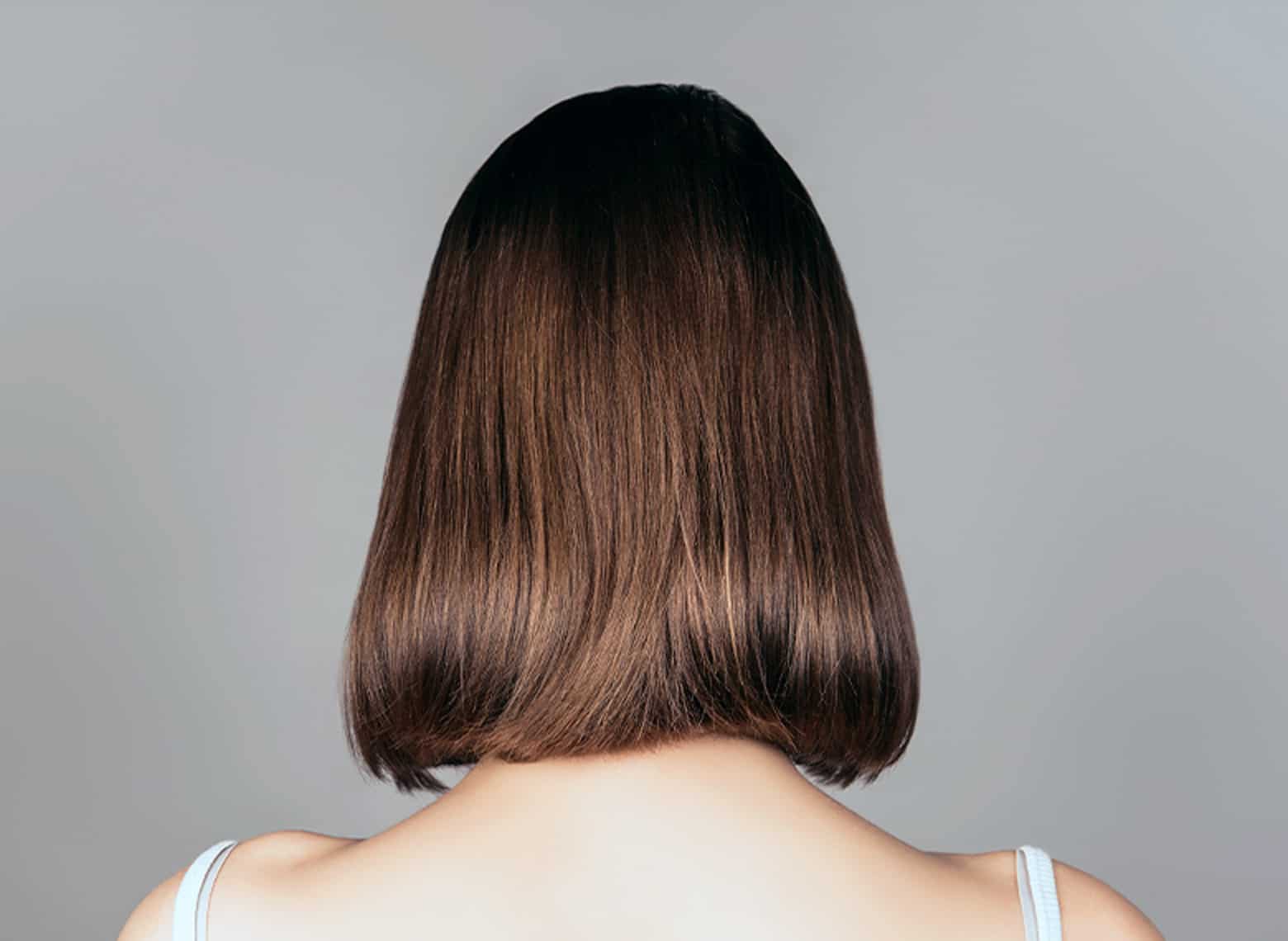 Sleek Dark Brown Blunt Bob — Classy Lesbian Haircuts