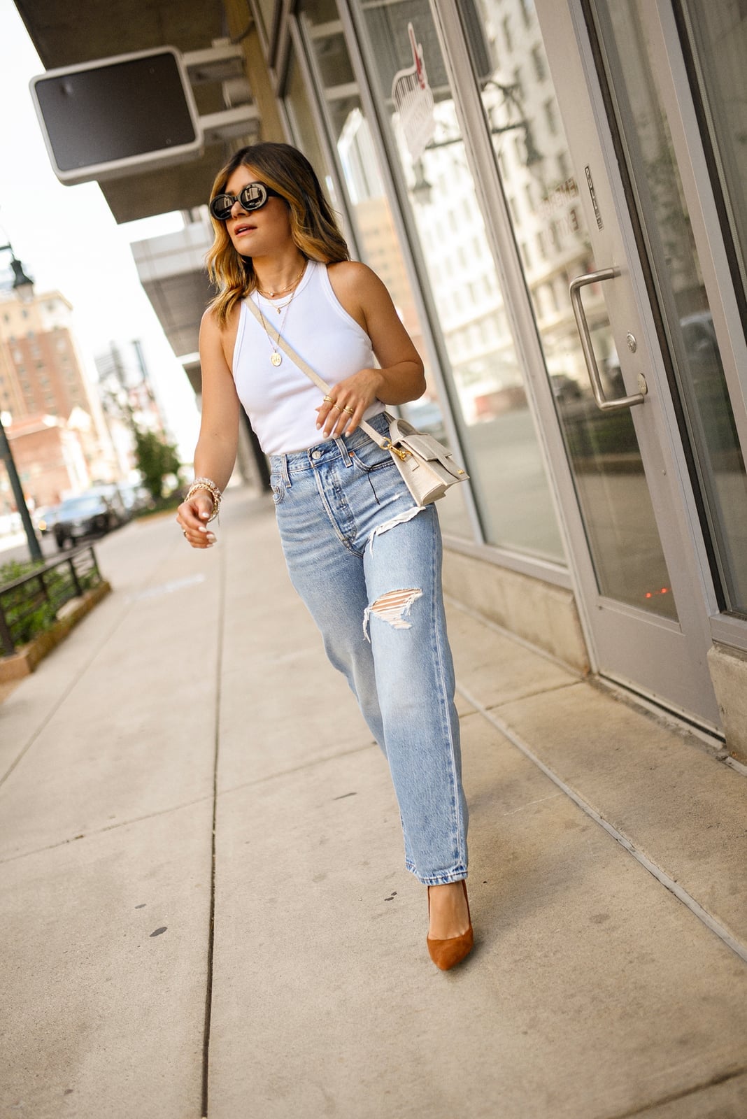 Light Blue Distressed Straight Leg Jeans with White Halter Top Light Blue Distressed Straight Leg Jeans with White Halter Top — Classy Light Blue Jeans Outfits