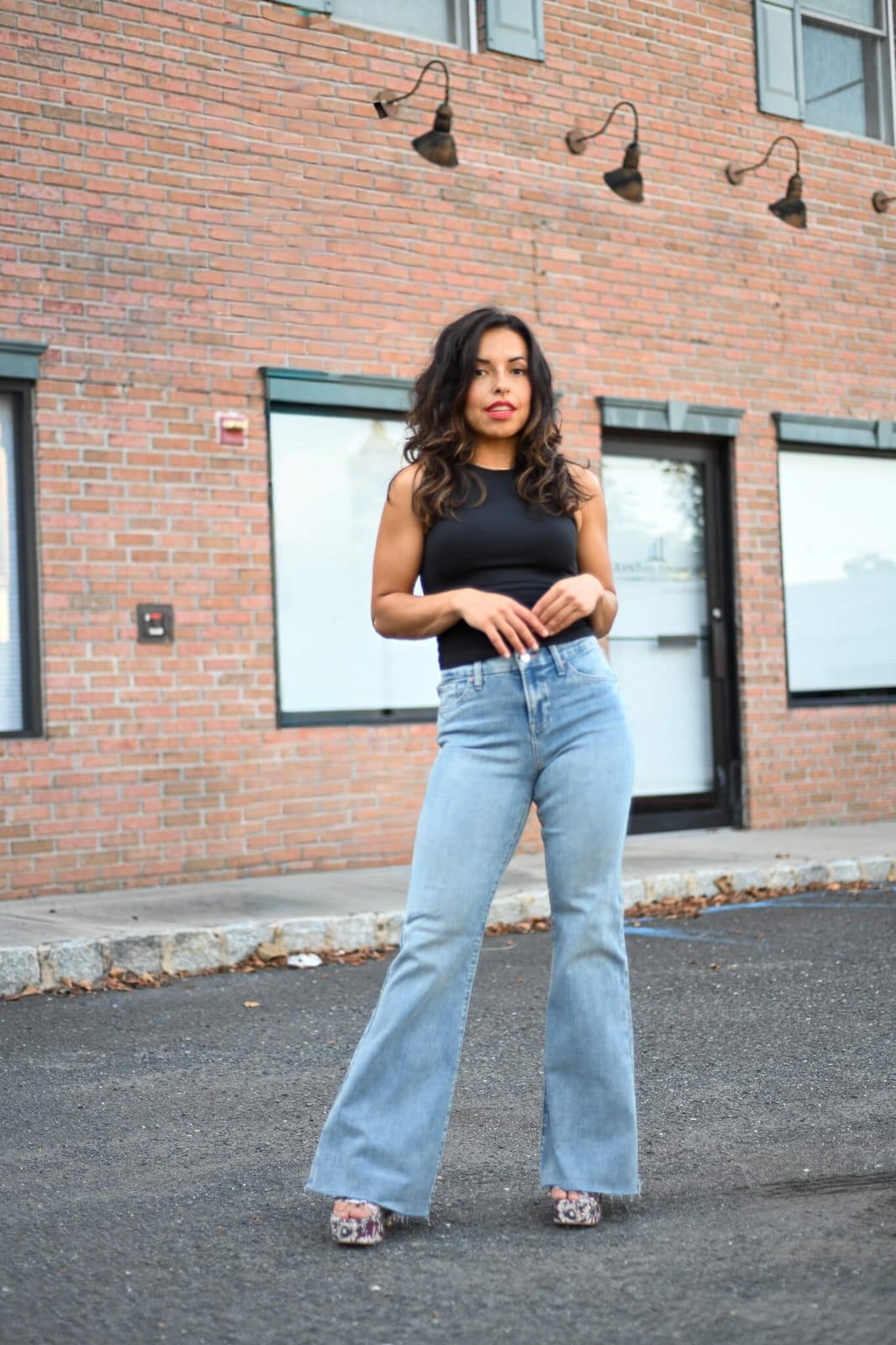 Light Blue Flare Jeans with Black Sleeveless Top Light Blue Flare Jeans with Black Sleeveless Top — Classy Light Blue Jeans Outfits
