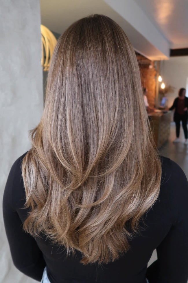 Mid-Back Blowout With Dimensional Blonde Highlights — Classy Light Brown Hair with Blonde