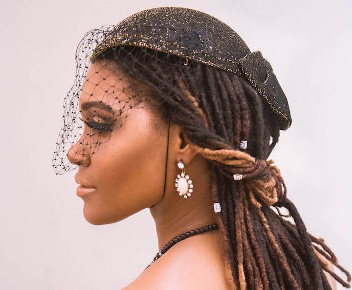 Mid-Back Brown Locs Tied Back With Accessories — Classy Locs Hair