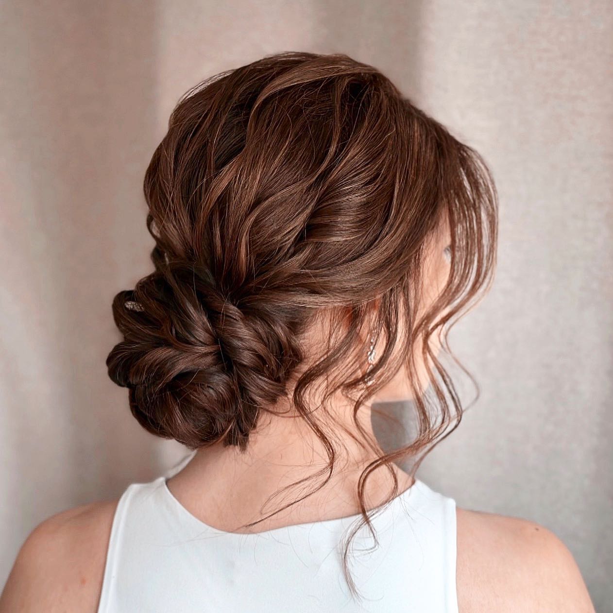 Dark Brown Textured Chignon With Wisps Dark Brown Textured Chignon With Wisps — Classy Loose Updo