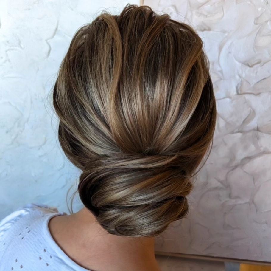 Smooth Brunette Twisted Low Bun Smooth Brunette Twisted Low Bun — Classy Loose Updo