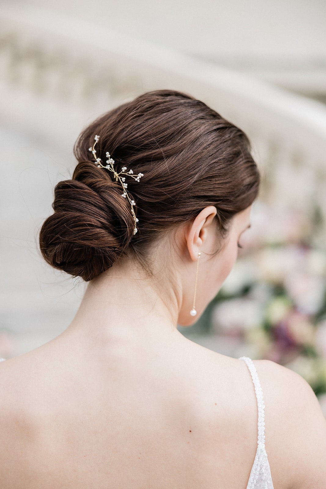 Middle Part Dark Brown Sleek Low Bun With Accessory — Classy Low Bun Wedding Hair
