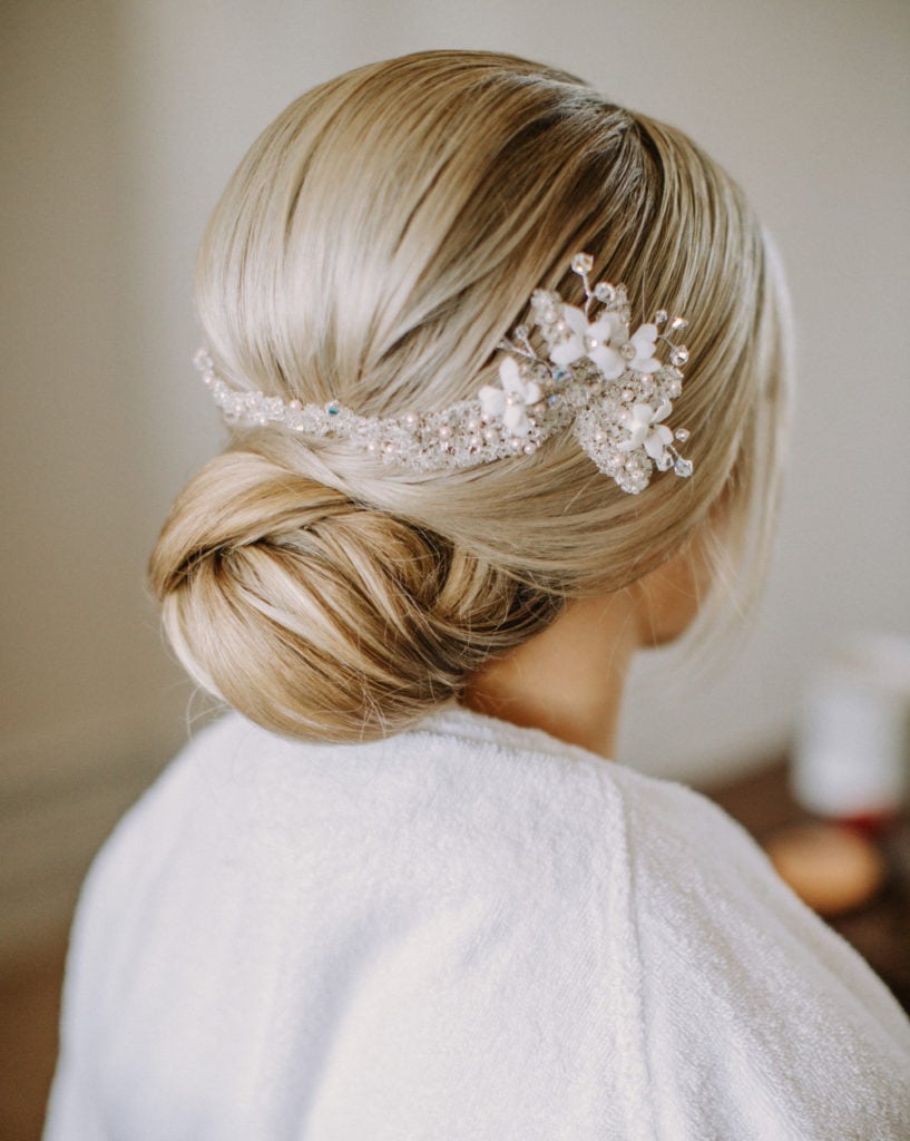 Elegant Blonde With Highlights Low Bun — Classy Low Bun Wedding Hair