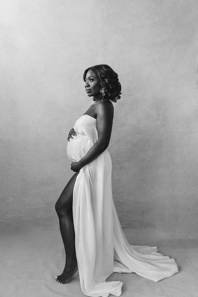 White Strapless Flowing Dress With High Slit — Classy Maternity Photoshoot Outfits
