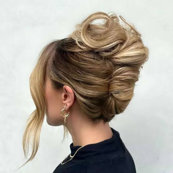 Blonde Highlighted Updo With Loose Tendrils Blonde Highlighted Updo With Loose Tendrils — Classy Messy Bun Outfit