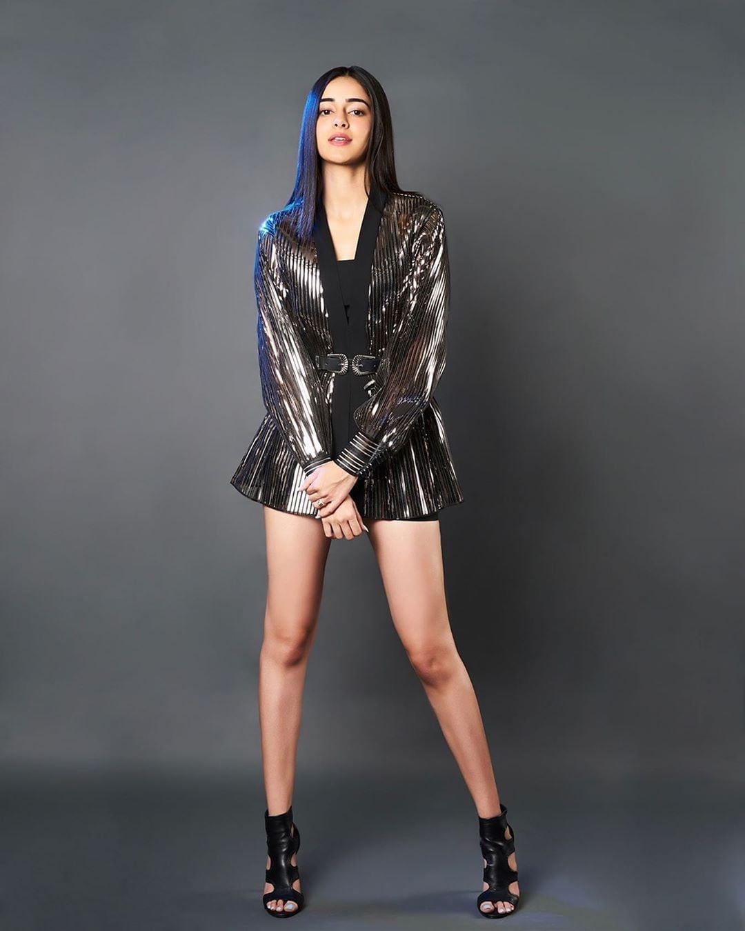 Sequined Jacket Over Black Top and Mini Skirt Sequined Jacket Over Black Top and Mini Skirt — Classy Metallic Outfits