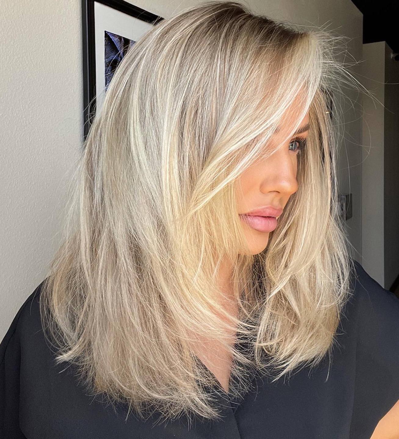 Mid-Back Platinum Blonde With Layers — Classy Mid Length Hair