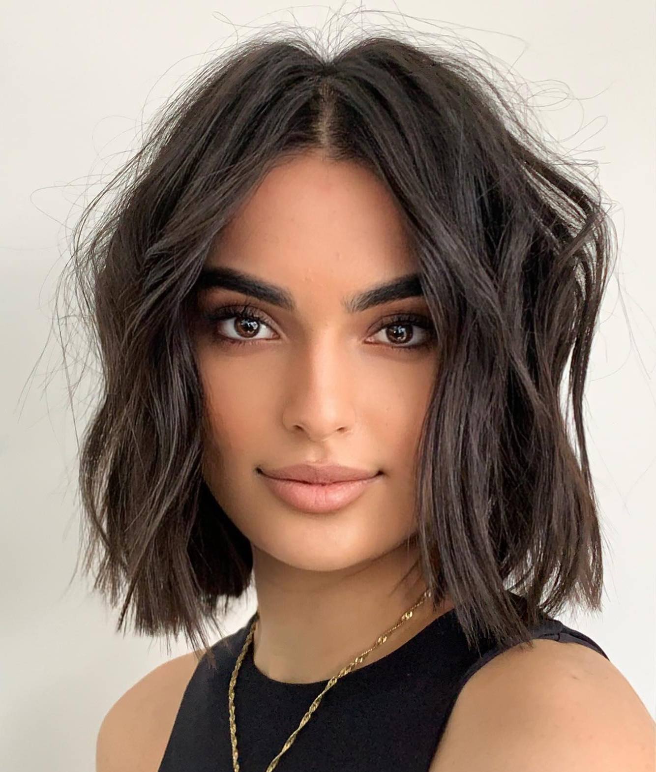 Lived-In Dark Brown Bob With Texture Lived-In Dark Brown Bob With Texture — Classy Middle Part Bob