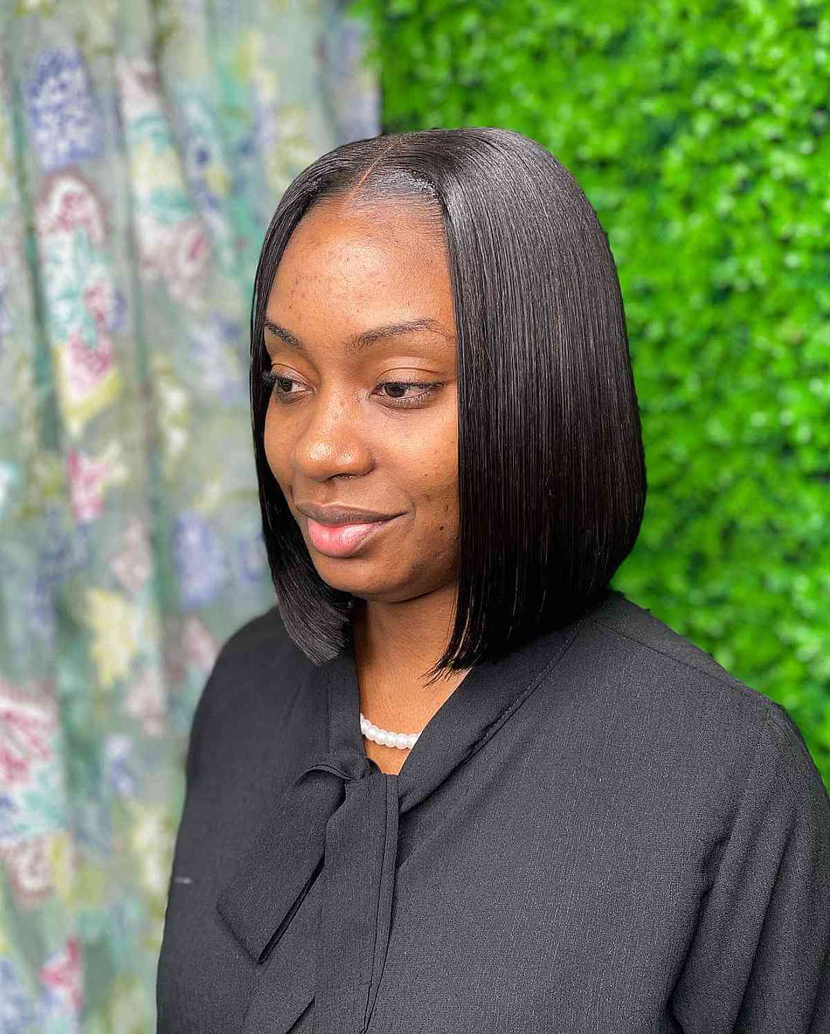 Sleek Black Chin Length Blunt Bob Sleek Black Chin Length Blunt Bob — Classy Middle Part Bob