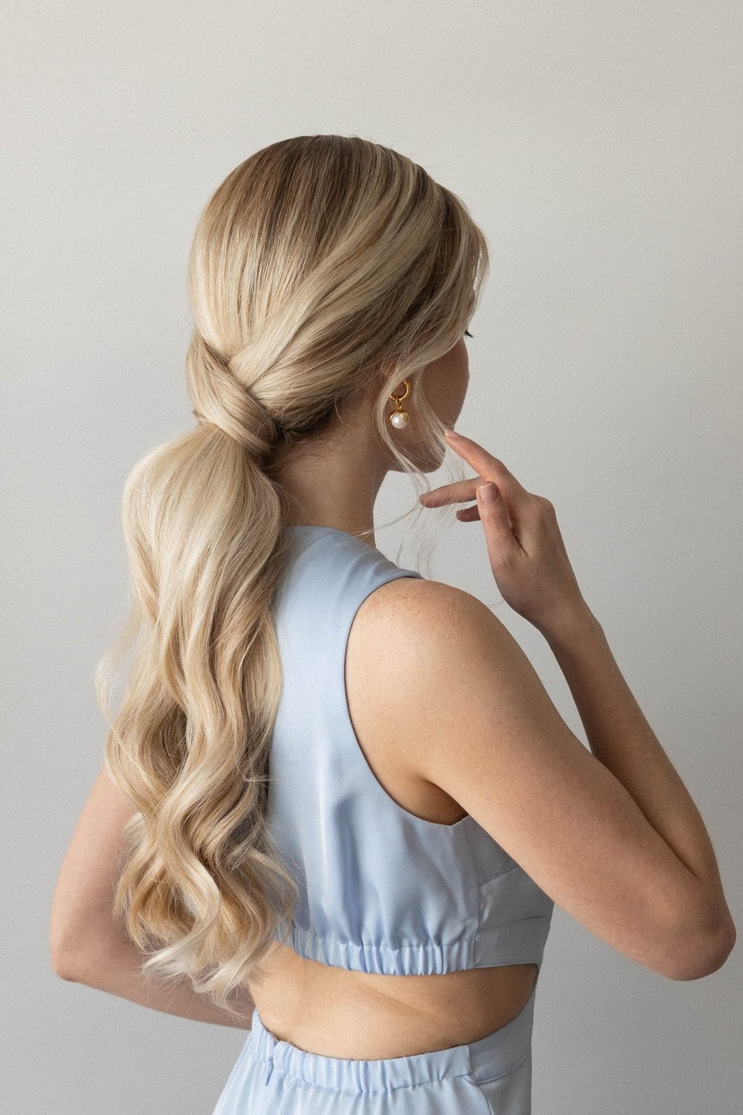 Voluminous Wavy Ash Blonde Ponytail Voluminous Wavy Ash Blonde Ponytail — Classy Middle Part Ponytail