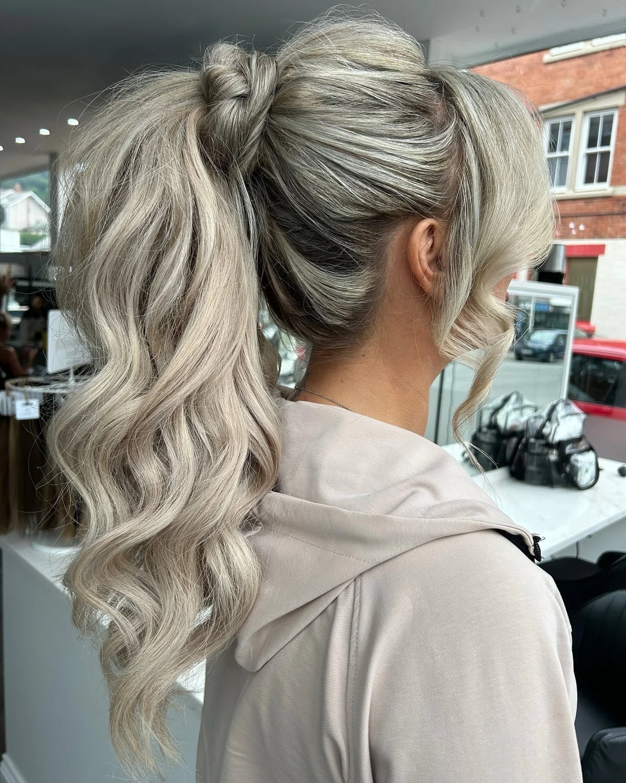 Platinum Blonde Ponytail With Voluminous Curls Platinum Blonde Ponytail With Voluminous Curls — Classy Middle Part Ponytail
