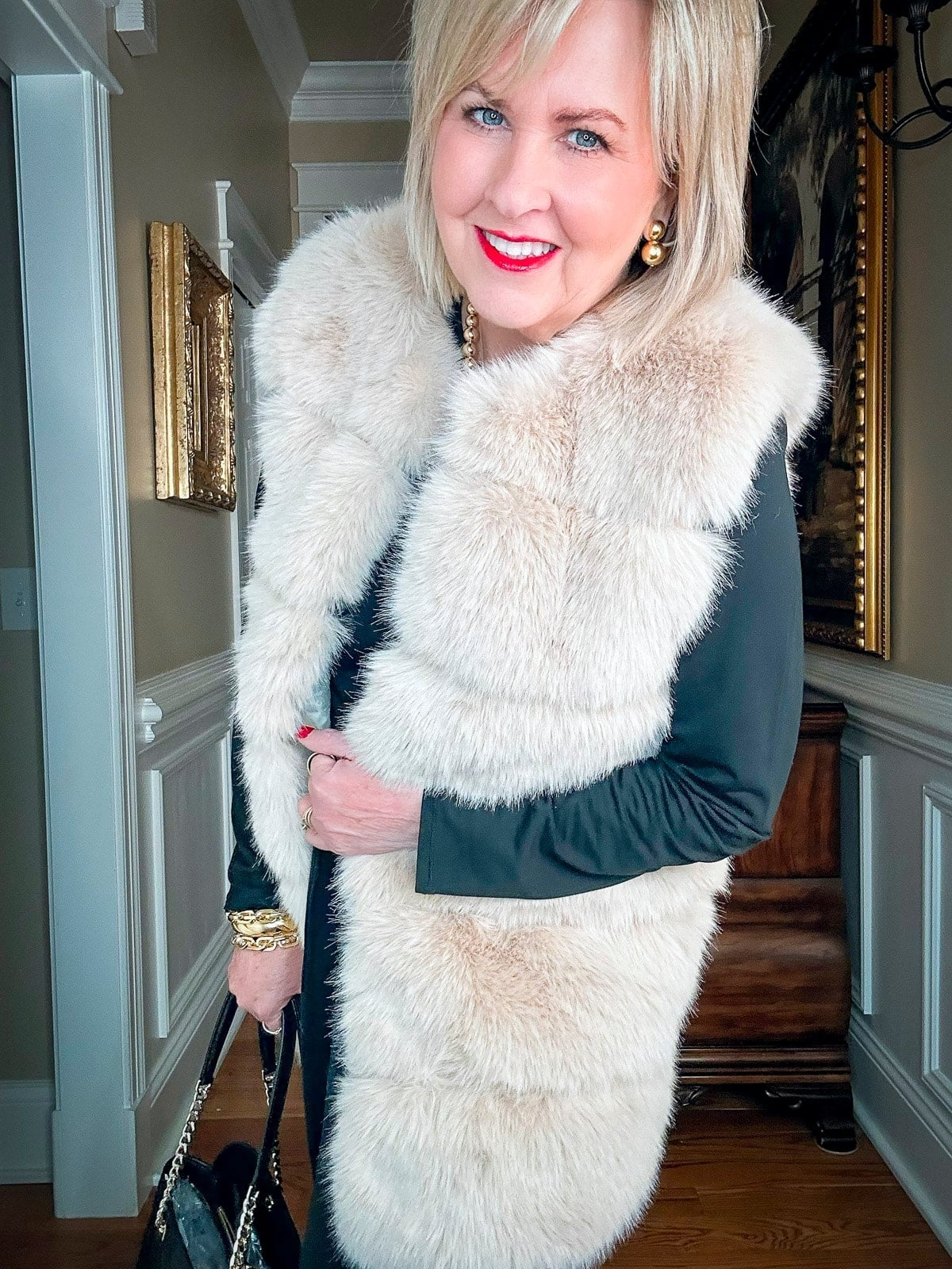 Faux Fur Vest Over Black Dress — Classy Mob Wife Outfits