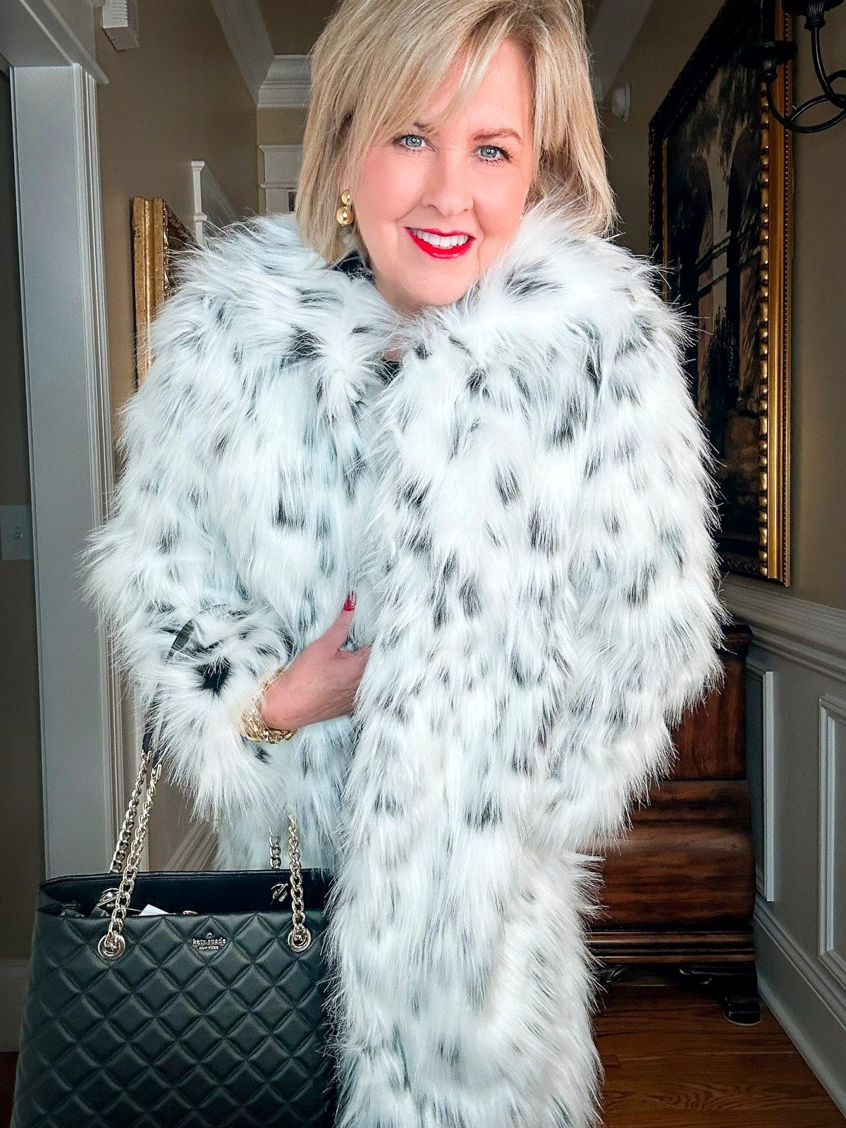 Spotted Faux Fur Coat Over Black Dress With Gold Necklace — Classy Mob Wife Outfits
