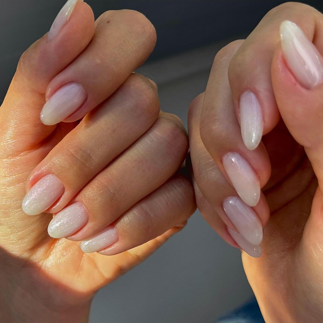 Short Almond Milky White Pearlescent Shimmer Nails Short Almond Milky White Pearlescent Shimmer Nails — Classy Nail Extensions