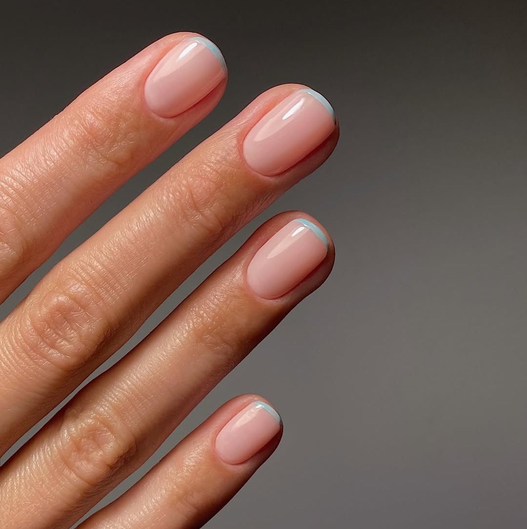Minimalist Light Blue Tip Short Oval Nails Minimalist Light Blue Tip Short Oval Nails — Classy Nail Shapes