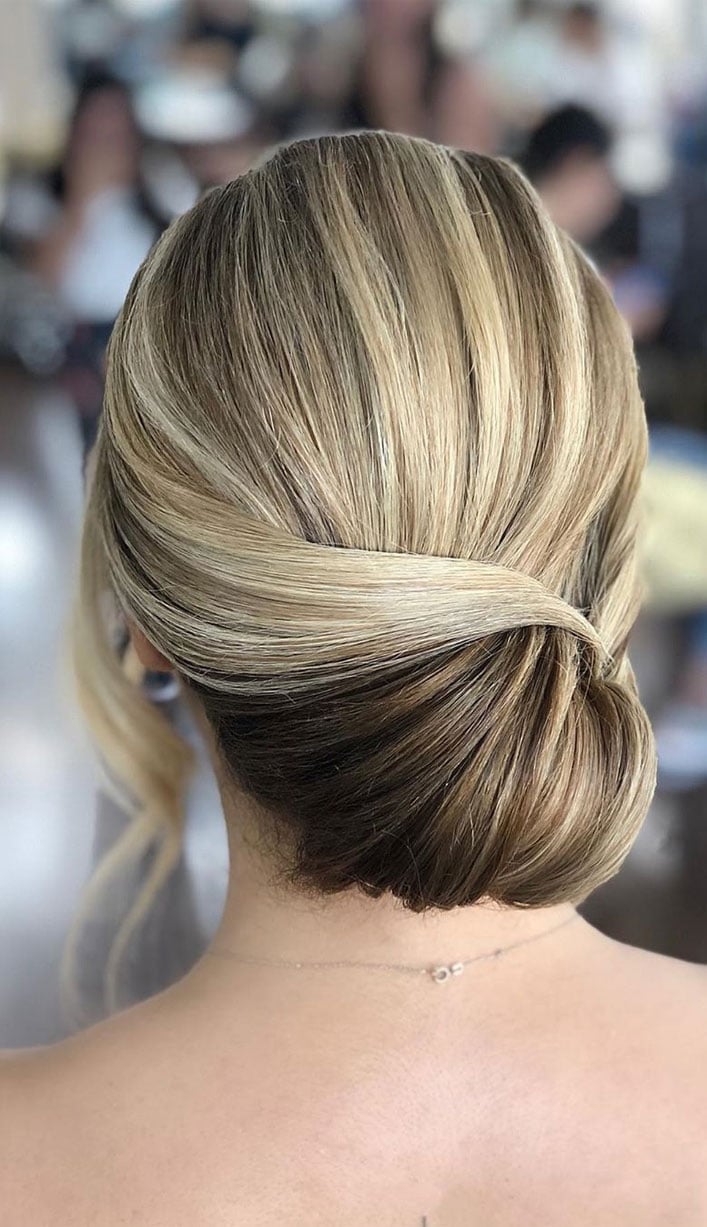 Blonde Low Bun With Twist Detail Blonde Low Bun With Twist Detail — Classy New Hairstyles