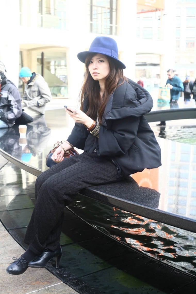 Puffer Jacket With Cable Knit Trousers and Fedora, Close-Up Take — Classy New York Style