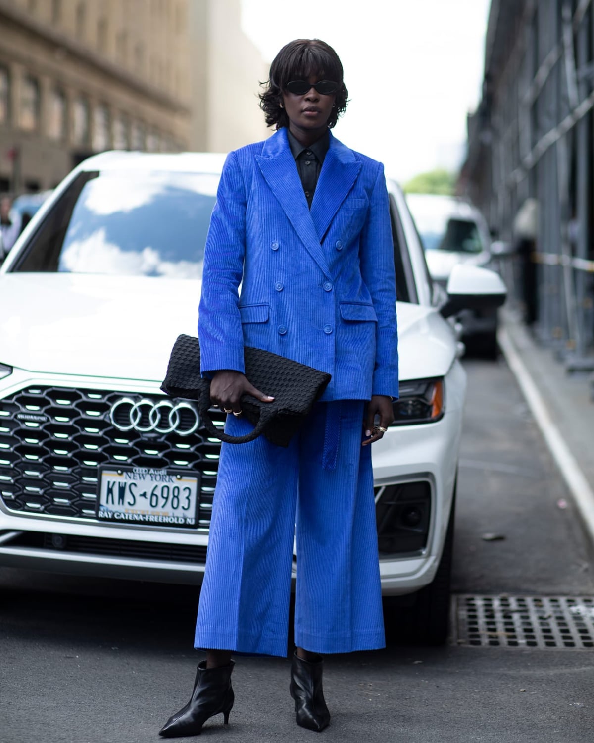 Vibrant Blue Corduroy Suit With Black Shirt and Wide-Leg Trousers — Classy New York Style