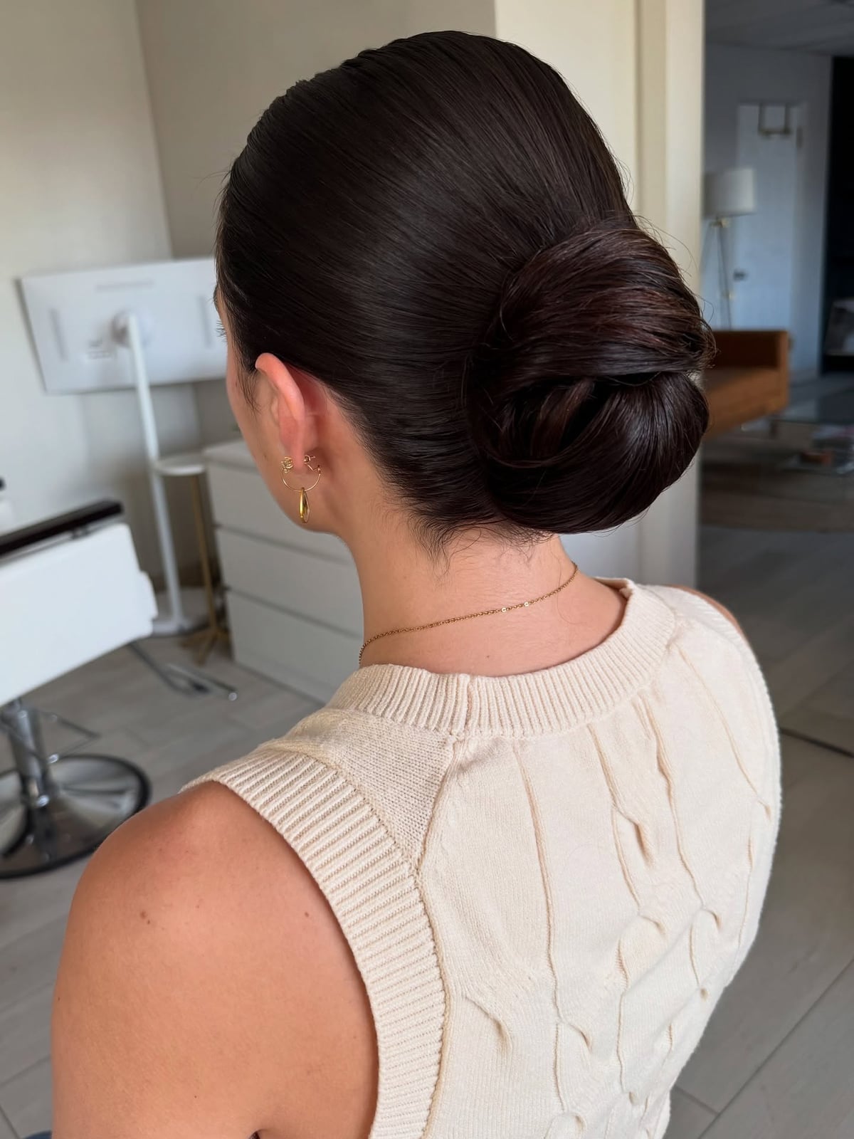 Sleek Dark Brown Low Bun With Middle Part, Collarbone — Classy Office Hairstyles