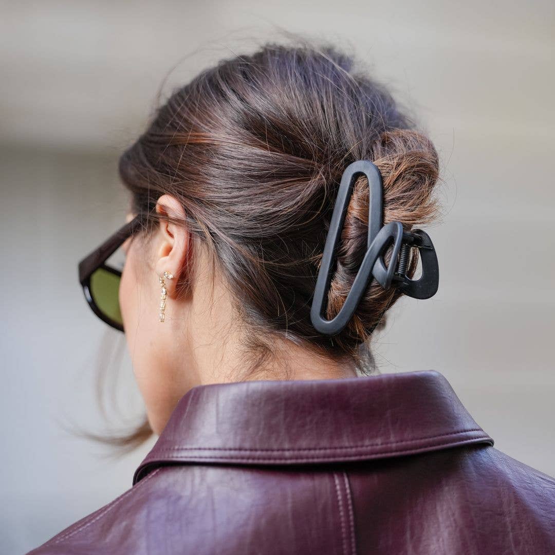 Messy Dark Brown Bun With Claw Clip — Classy Office Hairstyles
