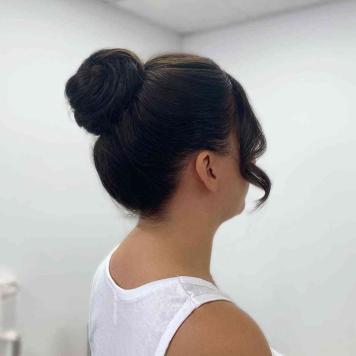 Voluminous Dark Brown High Bun — Classy Office Hairstyles