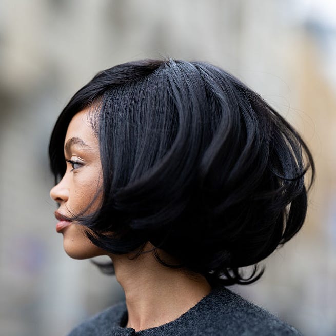 Layered Black Bob With Side Swept Bangs — Classy Office Hairstyles