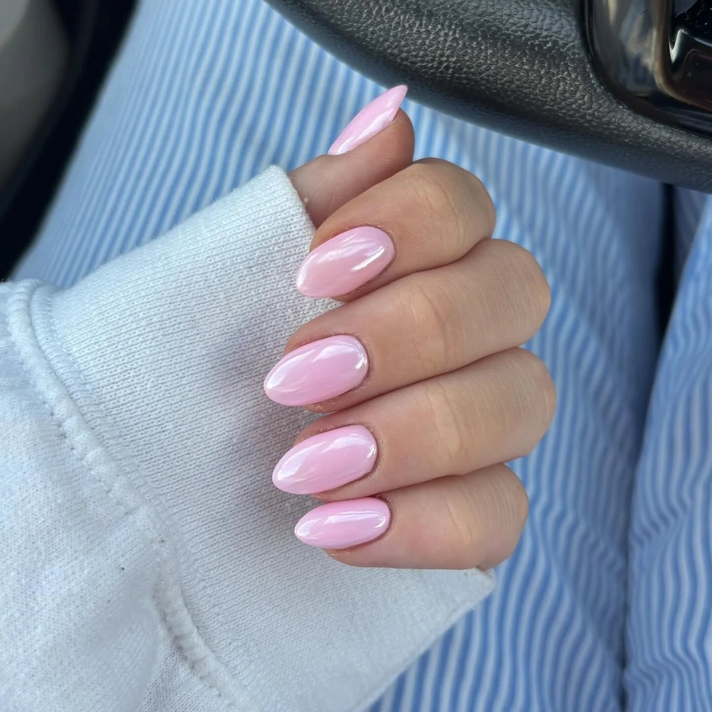Medium Almond Pastel Pink Glossy Nails, Close-Up Take Medium Almond Pastel Pink Glossy Nails, Close-Up Take — Classy One Color Nails