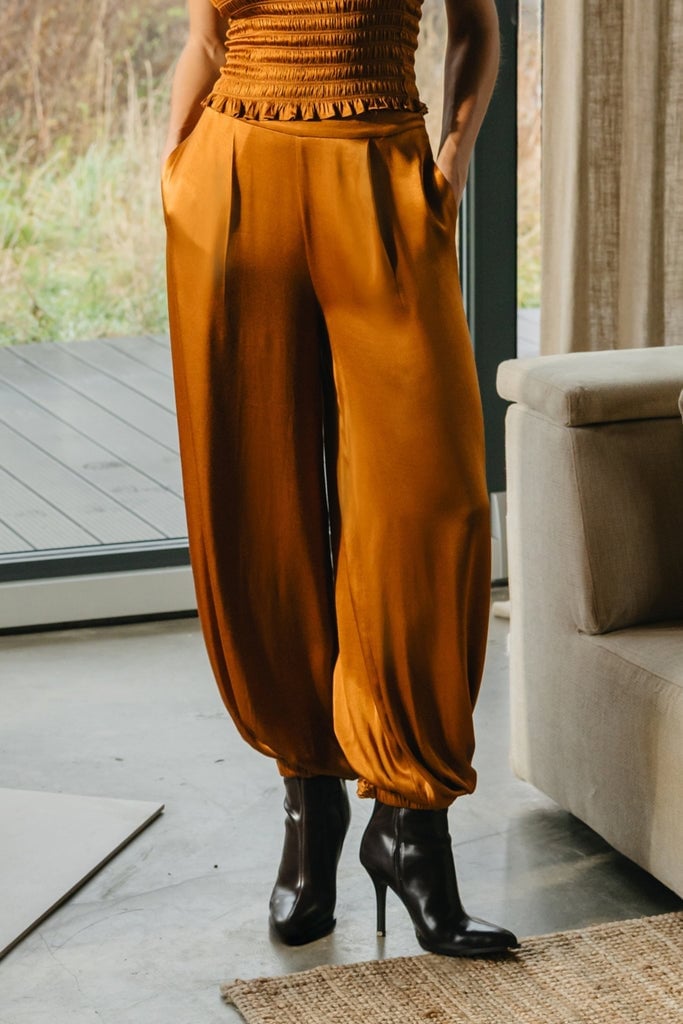 Ochre Satin Parachute Pants with a Smocked Top — Classy Orange Pants Outfits