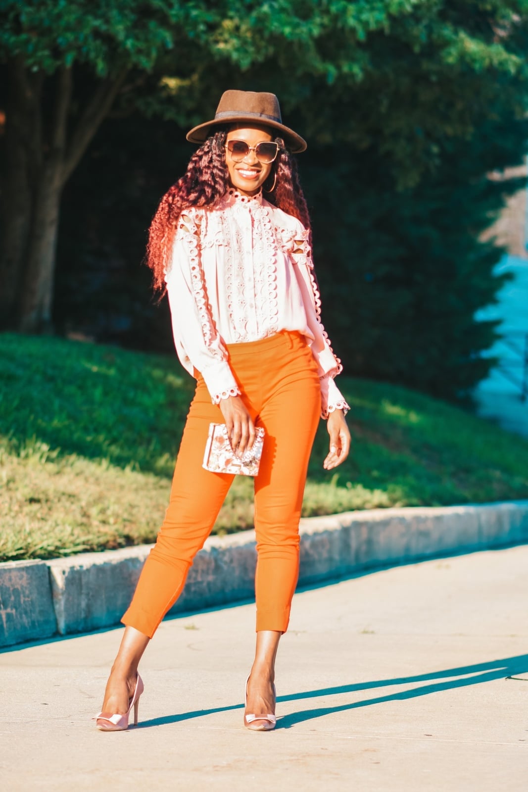 Slim-fit Cropped Orange Trousers with a Ruffled Blouse — Classy Orange Pants Outfits