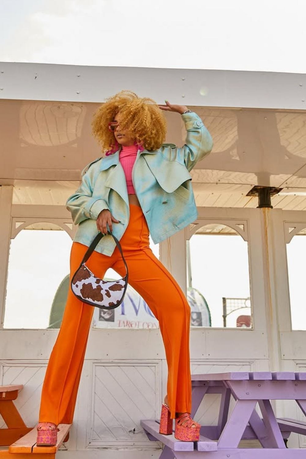 Vibrant Orange Wide-Leg Trousers with a Pink Turtleneck, Close-Up Take — Classy Orange Pants Outfits