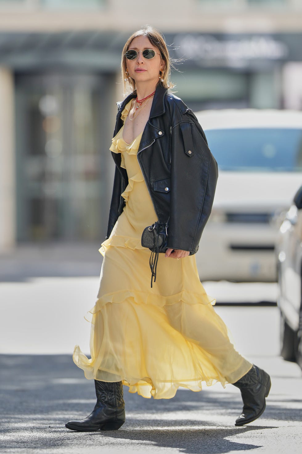 Yellow Ruffled Dress With Black Biker Jacket And Cowboy Boots — Classy Outfits with Cowboy Boots