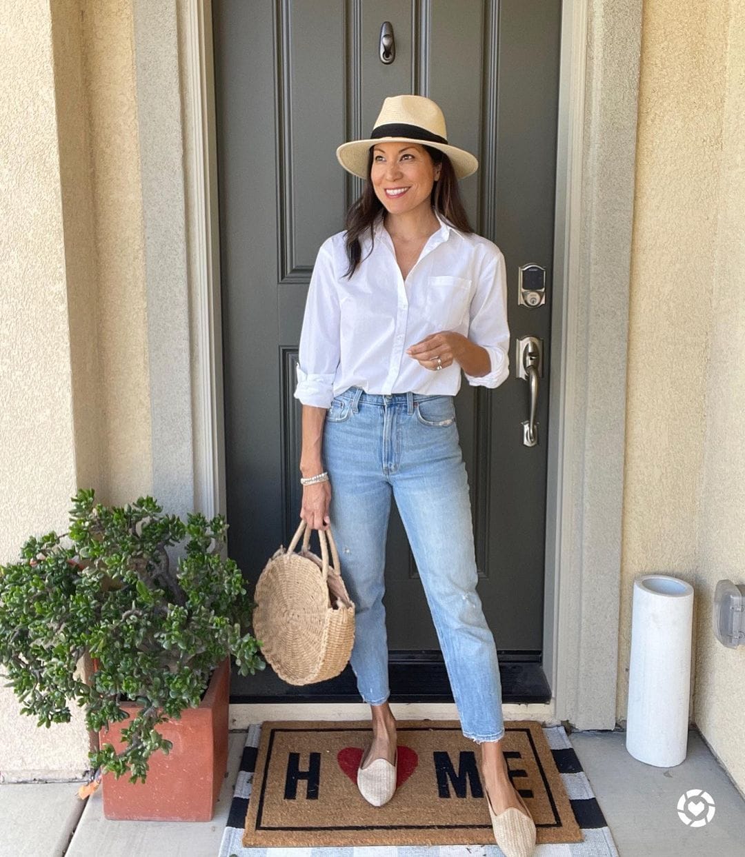 White Button-Down Shirt with Straight-Leg Jeans and Straw Hat — Classy Picnic Outfit