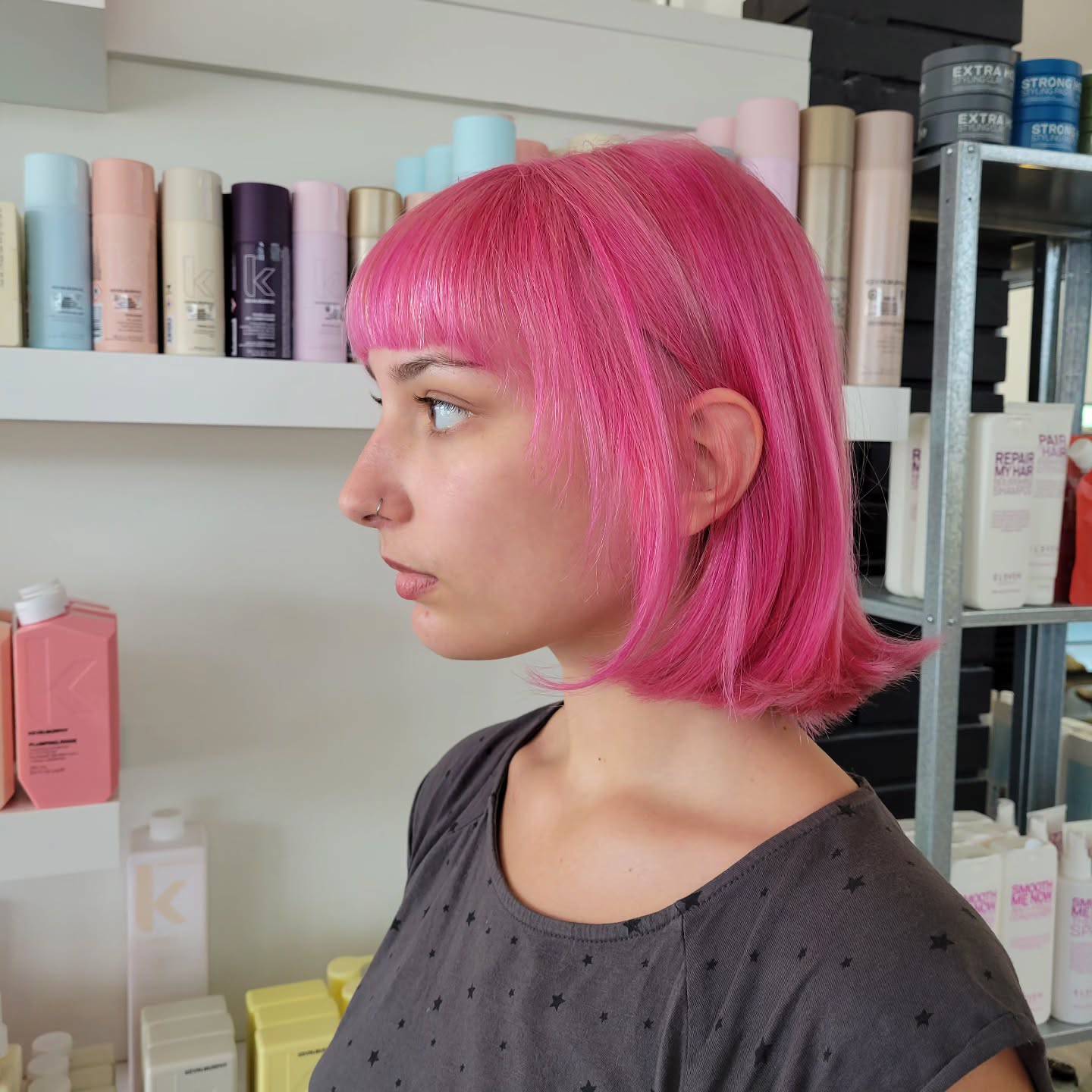 Vibrant Pink Bob With Blunt Bangs — Classy Pink Hair Color