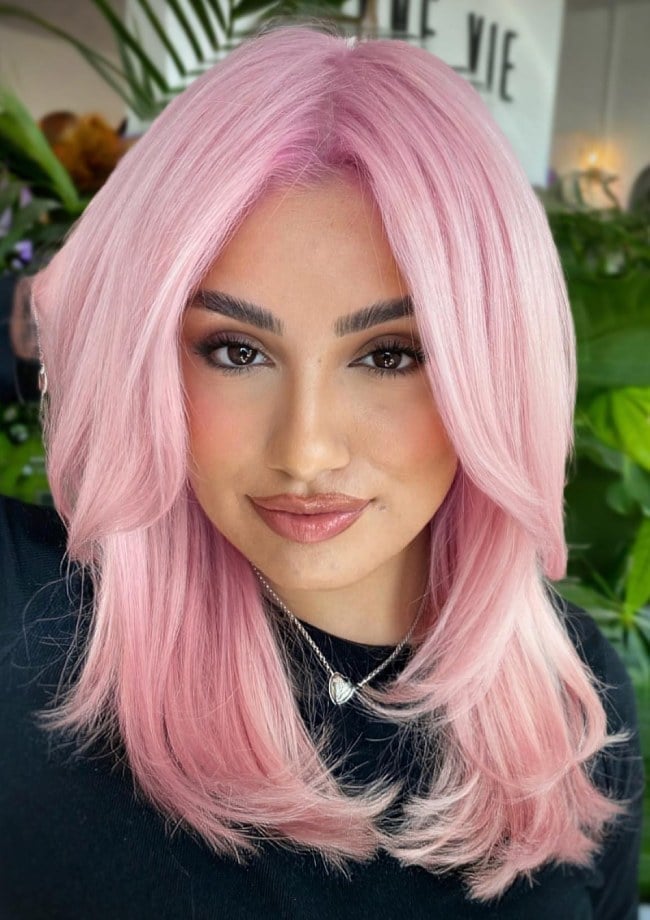 Pastel Blush Pink Collarbone Layers With Curtain Bangs — Classy Pink Hair Color