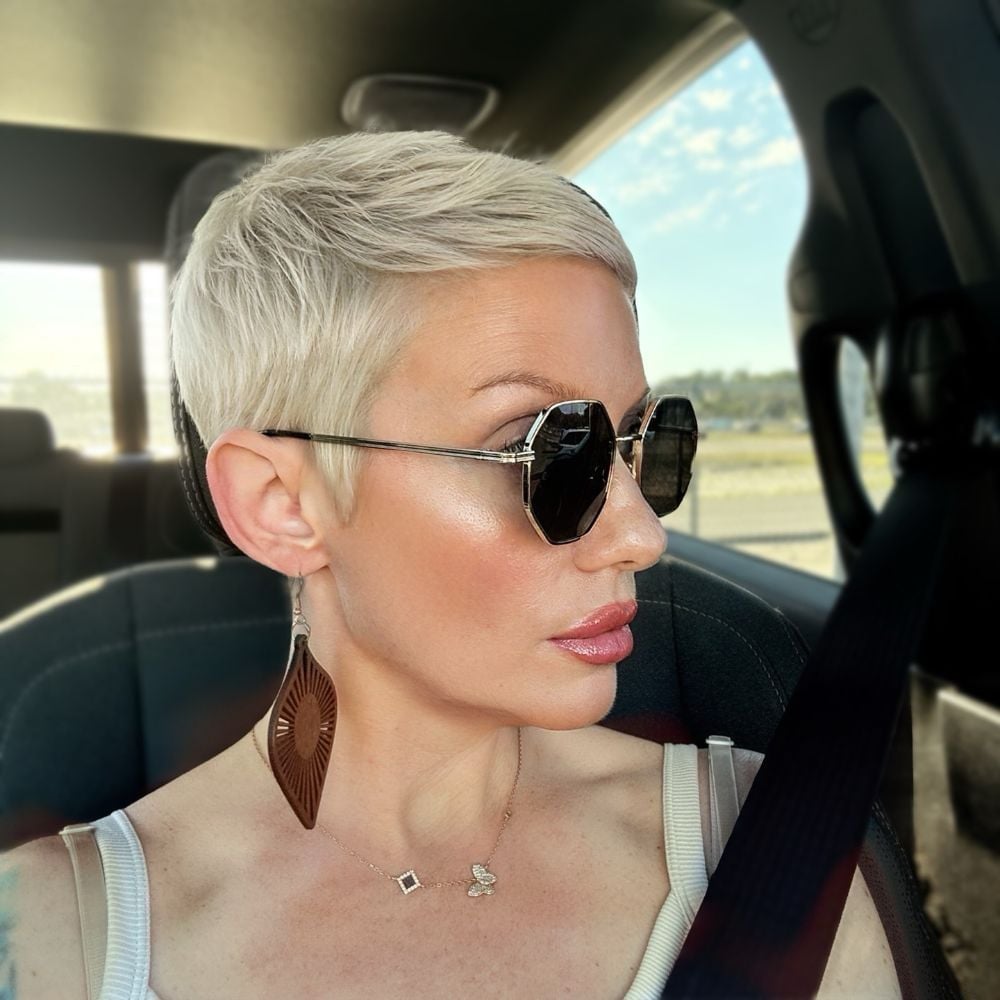 Edgy Platinum Pixie With Swept Bangs — Classy Pixie Cut