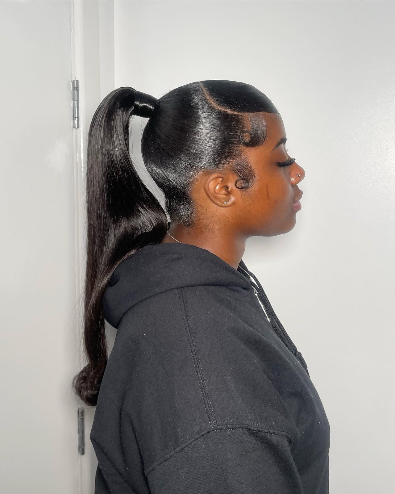 Sleek Black Ponytail With Swooped Baby Hairs — Classy Ponytail with Swoop