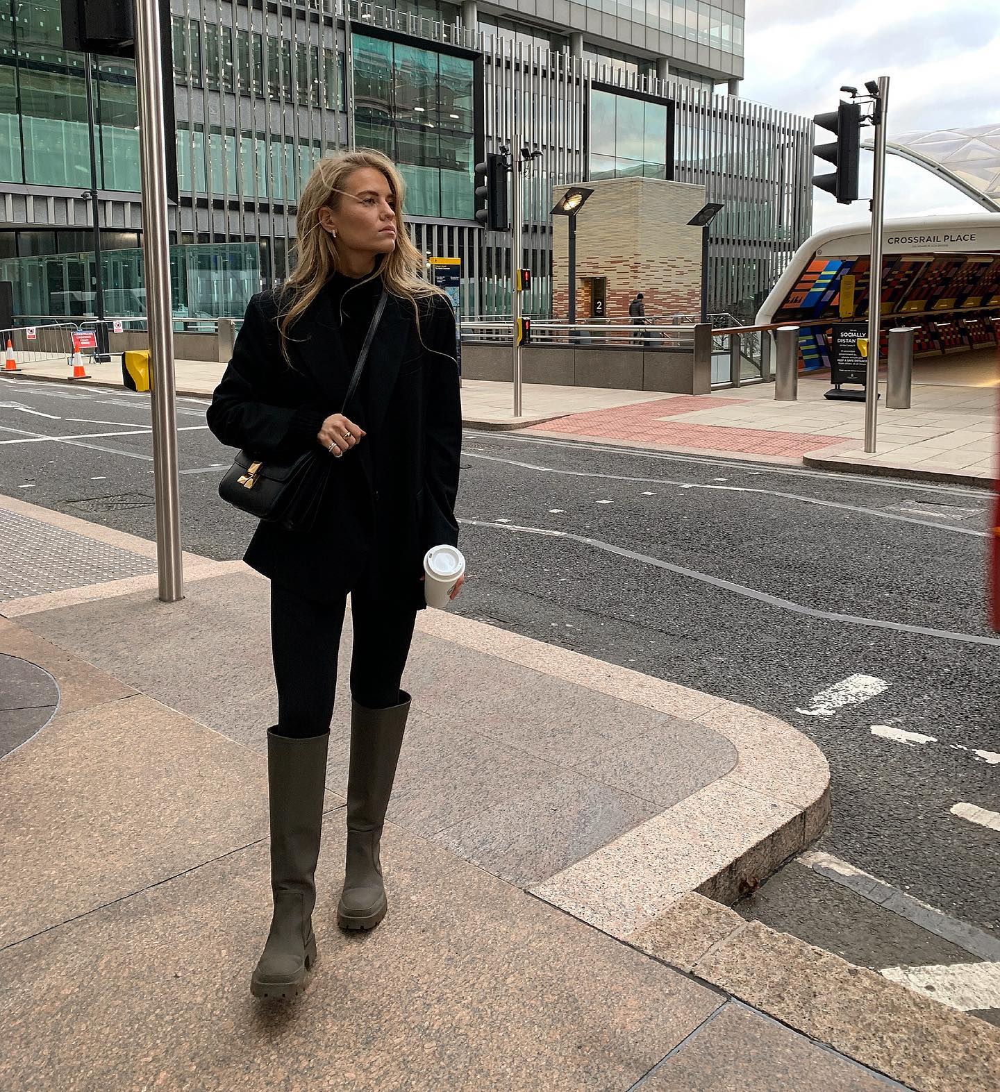 Black Blazer Over Turtleneck and Black Trousers with Tall Boots — Classy Rainy Day Outfits