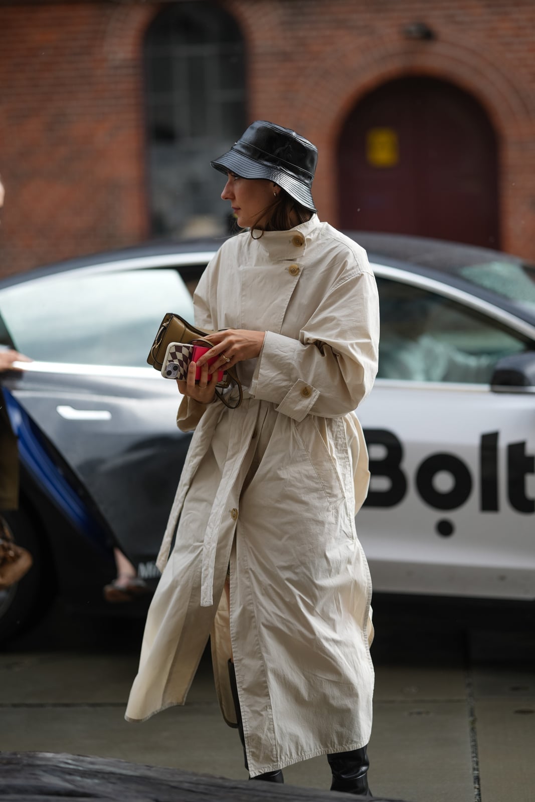 Oversized Cream Trench Coat with Bucket Hat — Classy Rainy Day Outfits