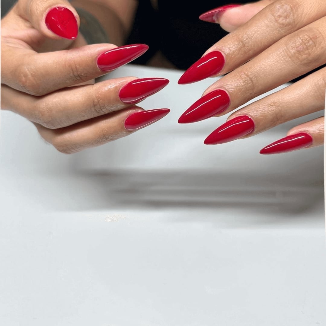 Vibrant Red Glossy Long Stiletto Nails With Even Finish — Classy Red Nails