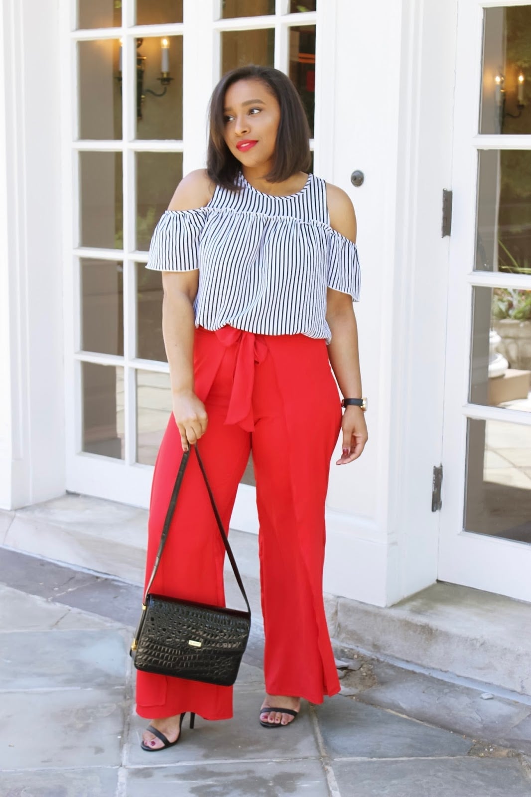 Wide-leg Red Palazzo Pants with a Black and White Striped Top — Classy Red Pants Outfits