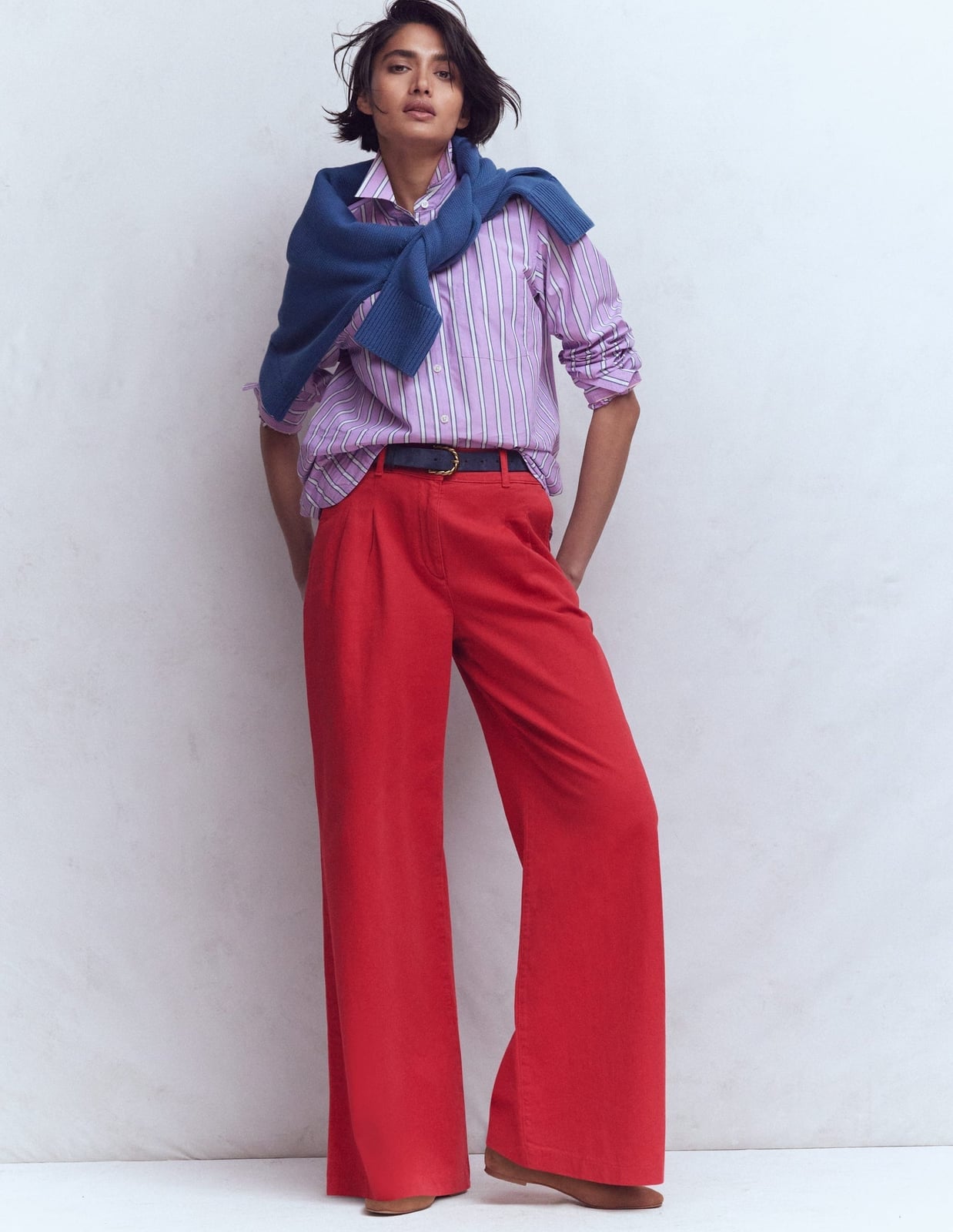 Vibrant Red Wide-Leg Trousers with a Striped Shirt and Sweater — Classy Red Pants Outfits