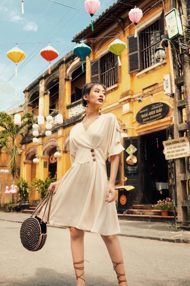 Pale Yellow Wrap Dress with Cinched Waist and Straw Bag Pale Yellow Wrap Dress with Cinched Waist and Straw Bag — Classy Retro Style