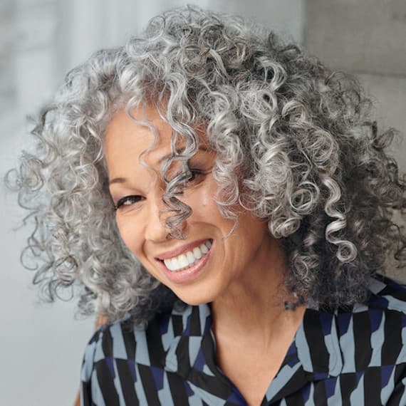 Shoulder-Length Defined Curls — Classy Salt and Pepper Hair