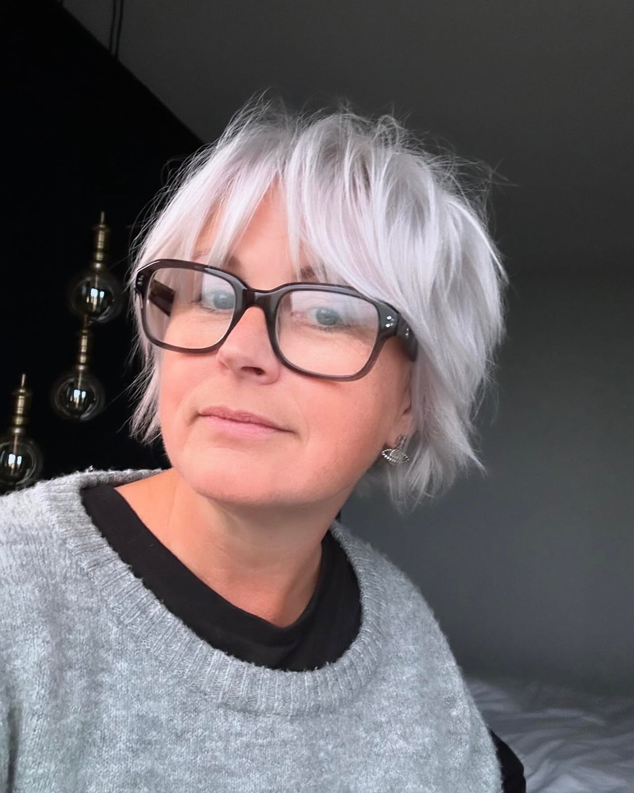 Silver Grey Shag Ear Length With Wispy Bangs Silver Grey Shag Ear Length With Wispy Bangs — Classy Short Shaggy Haircut