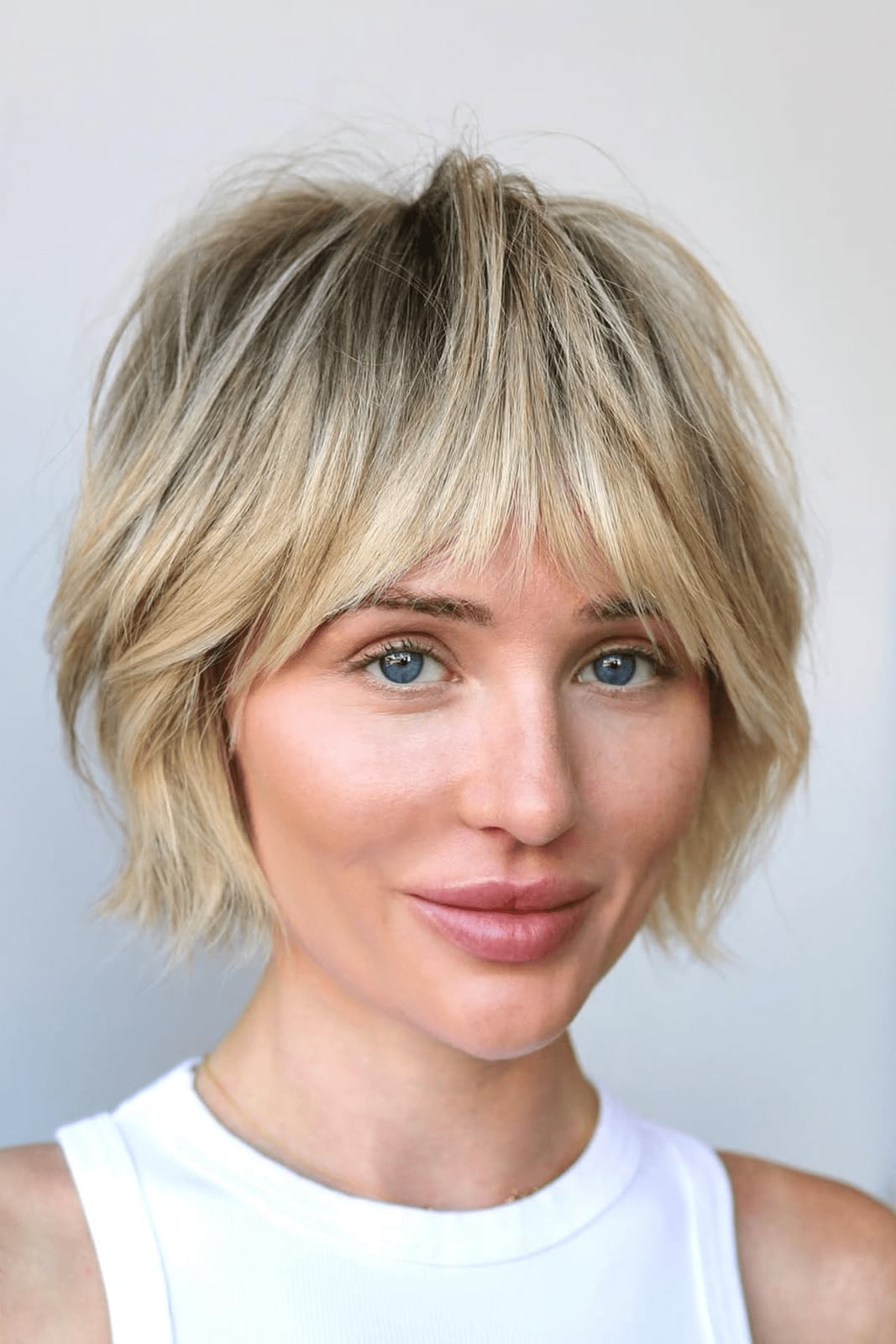 Grey Shag Ear Length With Textured Layers Grey Shag Ear Length With Textured Layers — Classy Short Shaggy Haircut