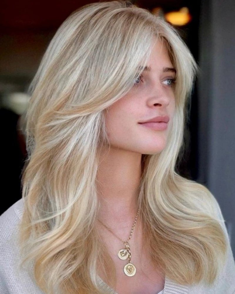 Mid-Back Blonde Layers With Curtain Bangs — Classy Side Bangs